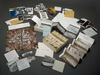 A box of multiples by Bochner, Christo, Dibbets, Graham, Huebler, Kaprow, Kirby, Kosuth, LeWitt,...