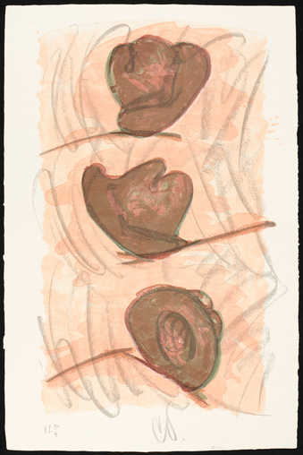 An image of a man's hat rolling down the street, seen at three instants along its path.  A...