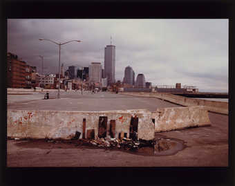New York skyline in the background with a garbage imitation of the skyline in the foreground
