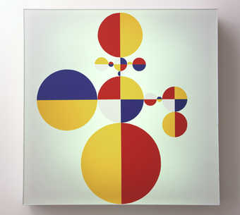 light box with flourscent bulbs inside; white plastic sheet on the front with round red, yellow...