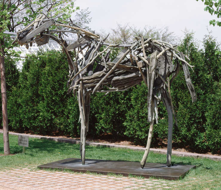 Horse constructed of bronze sticks and branches