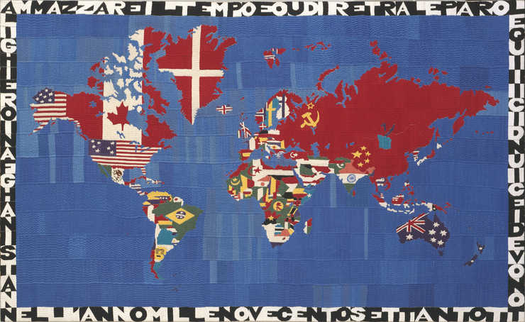 An embroidered map of the world in which land masses are colored with the controlling countries...