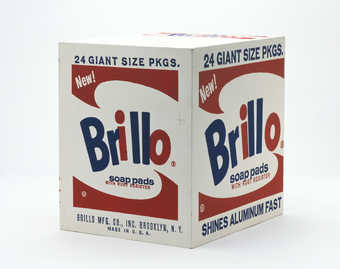 a wooden paint/printed grocery store carton of Brillo Pads