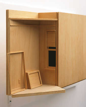 A balsa model of a Studio and exhibition Gallery with a large box space in between