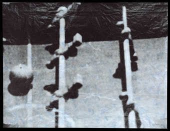 One of four variations of the same image printed in four colors (gray, gold, blue and green) on...