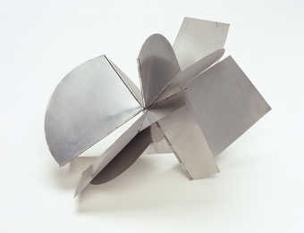 A table scale work, consisting of 16 hinged plates that allow for the display of the work in...