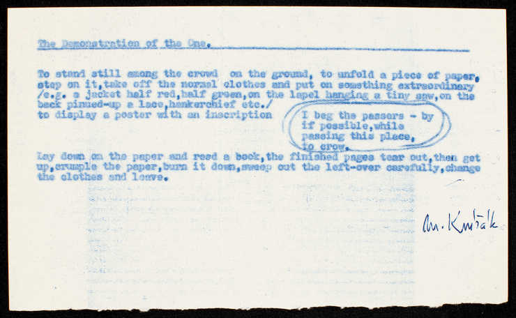 Blue type on torn half sheet of white paper; folded.  Score for a happening that occurred in Prague.