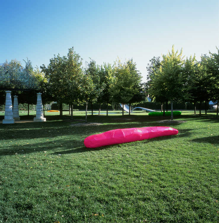 A large dayglow pink pickle-like form.